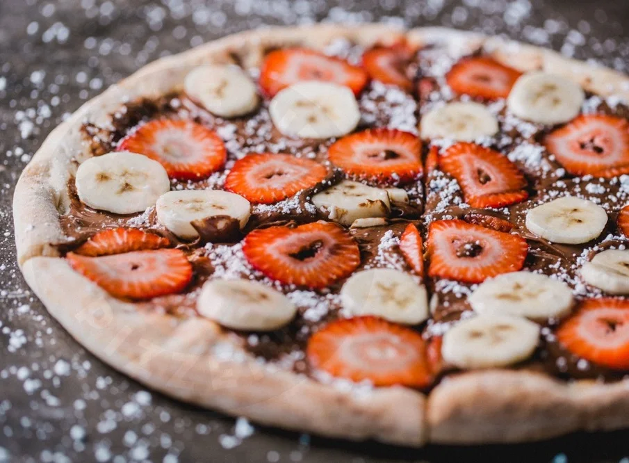 Strawberry and banana dessert pizza